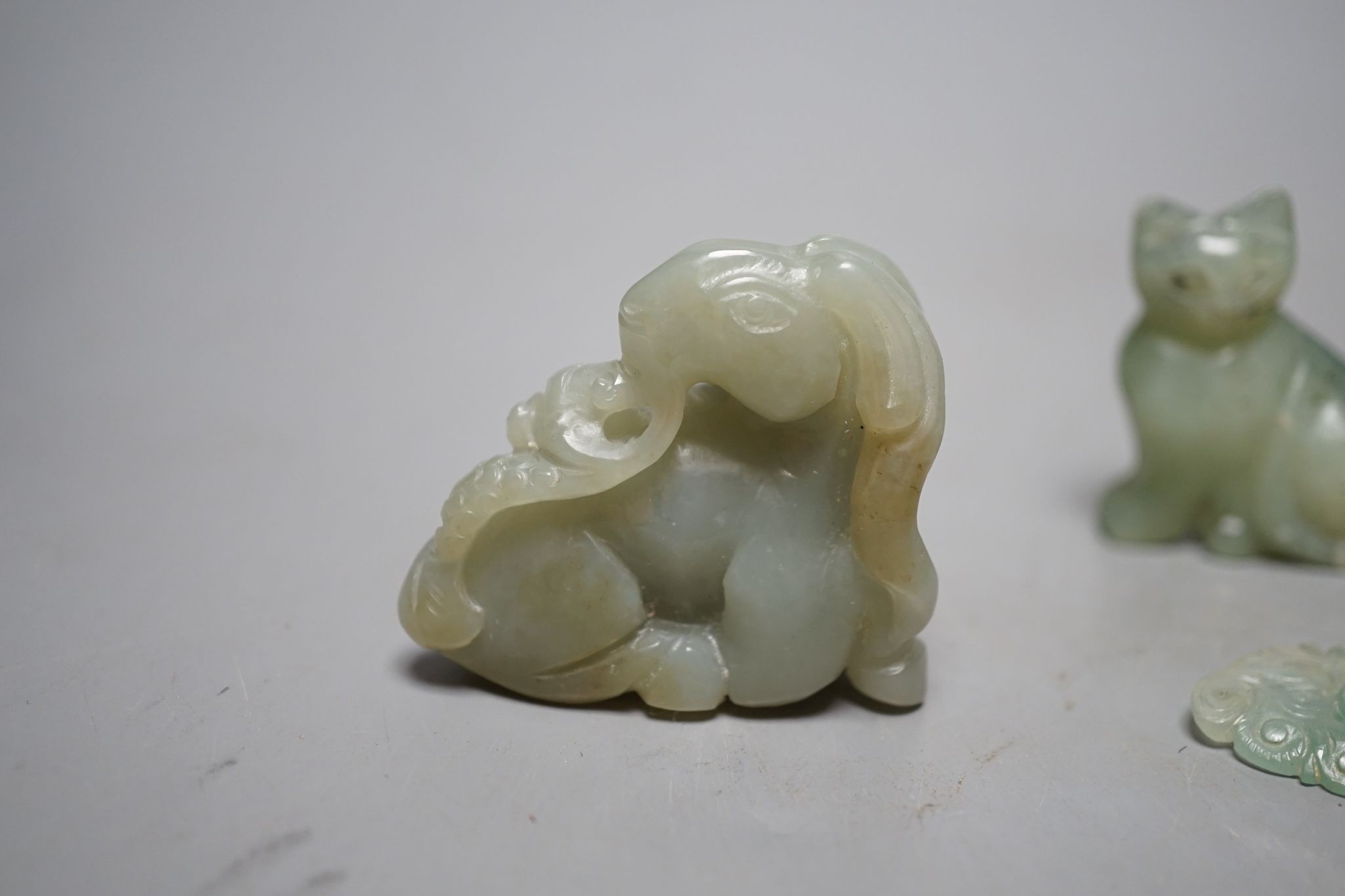 Four Chinese jade carvings of animals and fruit, tallest 4cm